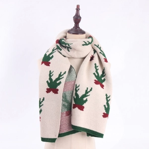Winter knit scarf featuring festive reindeer patterns in cream, red and green colors