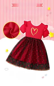 Detail of red knit top with gold heart and layered mesh tutu skirt for girls
