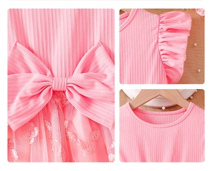 Detailed view of pink floral embroidery on mesh tutu with soft ribbed fabric and bow