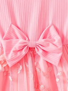 Pink girl princess dress featuring large bow and floral embroidery on layered mesh tulle