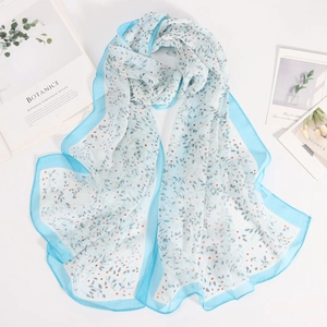 Lightweight sky blue floral chiffon scarf with red fruit pattern on white background