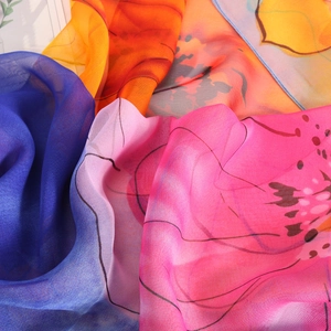 Elegant floral print shawl with vibrant color gradients in lightweight breathable fabric