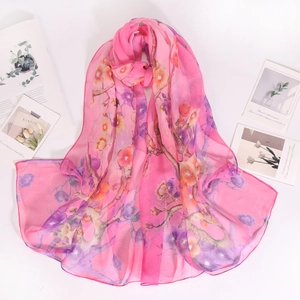 Bright pink georgette silk scarf with floral bird print for sun protection and beach wear