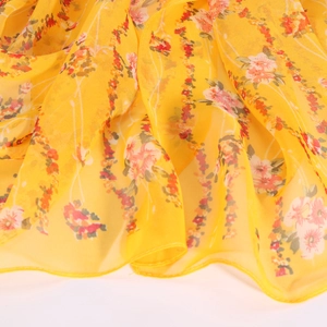 Floral print yellow georgette scarf with lightweight breathable fabric and hemmed edges