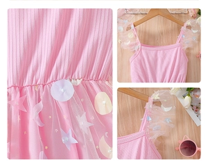 Detail of pink girls princess dress with star appliques and layered tulle texture