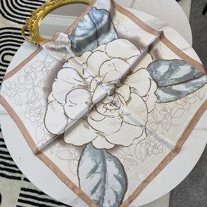 Elegant camellia print silk scarf in pearl white and champagne with floral pattern