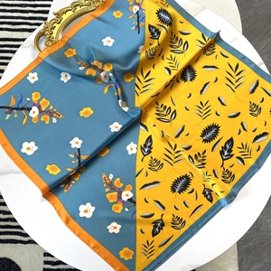 70cm bright floral satin square scarf with contrast colors on marble surface