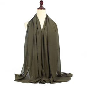 Deep olive green lightweight 75D pearl chiffon scarf on model with elegant drape