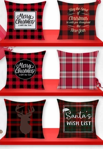 Detail of six Christmas pillow covers with buffalo plaid patterns and deer silhouettes