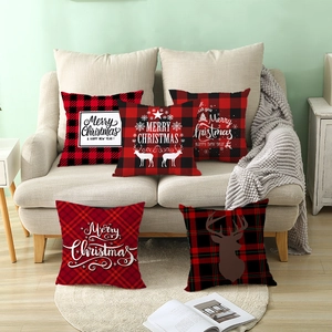Set of Christmas red plaid pillow covers with reindeer silhouettes and holiday greetings