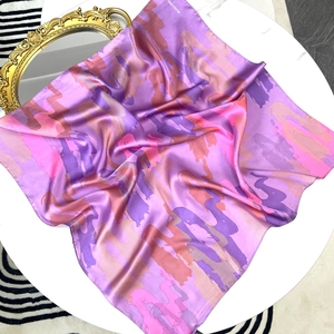 70cm camouflage silk square scarf with purple abstract print on a white table