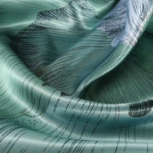 90cm square silk scarf with mint green floral print and elegant satin texture