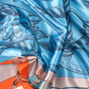 Sky blue satin square scarf with nautical chain print and elegant silk texture