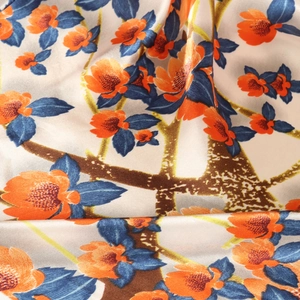 Elegant champagne satin silk scarf with orange floral and blue leaf patterns