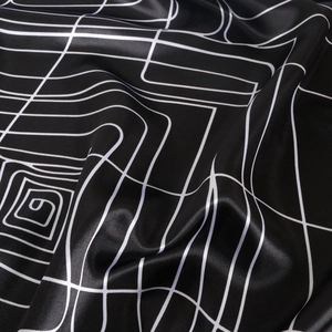 90cm satin square scarf with geometric white line patterns on black silk-like fabric