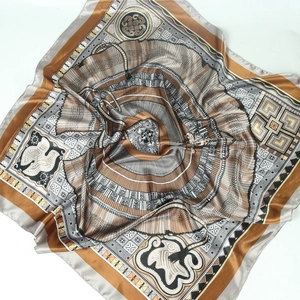 Retro 90cm satin square scarf featuring tribal geometric patterns in caramel and black