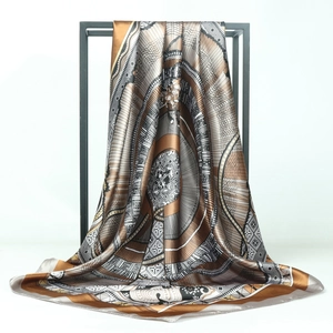 Vintage 90cm satin silk square scarf with geometric print displayed on a black rack