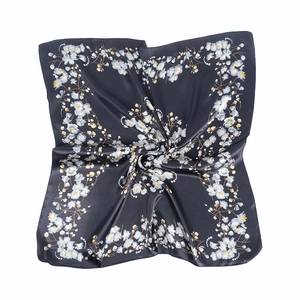 Navy blue satin floral square scarf with elegant white flower print on a white background