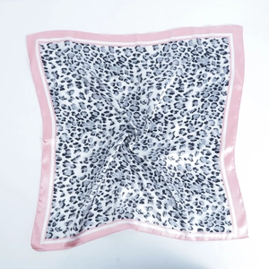 Square satin scarf with leopard print and pink border, stylish head wrap for women