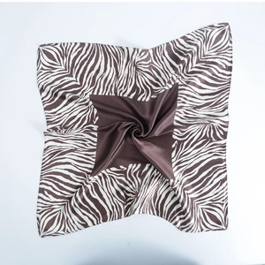Brown silk satin square scarf with zebra stripe border and elegant central twist