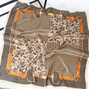 Golden paisley and houndstooth print satin square scarf with chain belt patterns