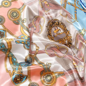 Luxurious satin silk scarf with vintage chain and horse print in pastel pink and blue