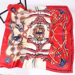 Satin silk scarf featuring a red equestrian horse pattern with bridles and tassels