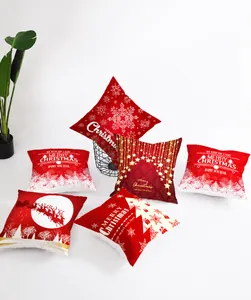 Detailed view of red Christmas peach skin pillow covers with reindeer and snowflake patterns