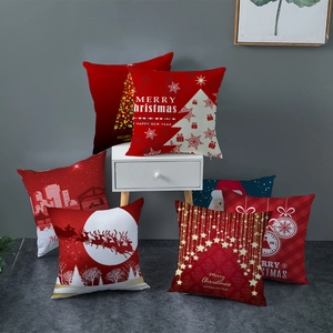 Red Christmas peach skin pillow covers with reindeer and snowflake holiday patterns