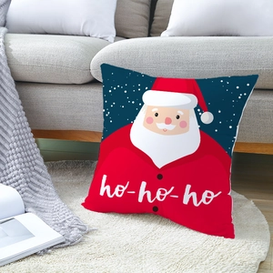 Christmas Santa Claus peach skin pillowcase with Ho-Ho-Ho text on a gray sofa