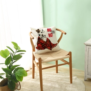 Nordic Christmas pillow cover featuring a Jack Russell terrier with HO HO HO festive text