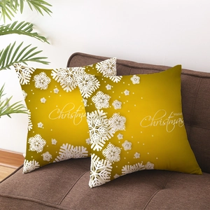 Set of 2 golden Christmas pillow covers with white snowflakes and Merry Christmas text