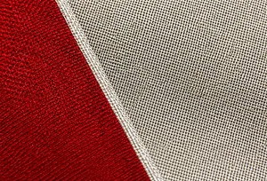 Detailed view of hand-stitched seams and textured polyester fabric on cartoon pillow covers