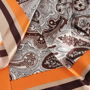 Classic paisley printed satin silk scarf with vintage orange and brown geometric borders