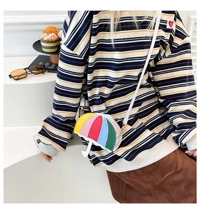 Unique umbrella-shaped crossbody bag with multi-color patchwork and white strap