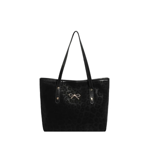 Large leopard print tote bag for women featuring a gold butterfly buckle and dual handles