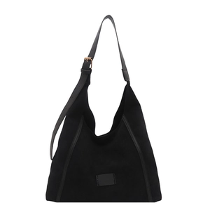 Minimalist black faux suede large tote bag with adjustable strap and gold metal buckle