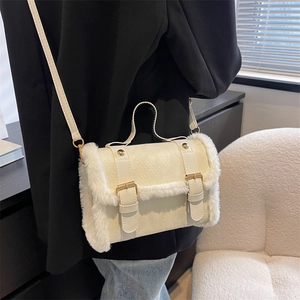 Creamy white plush faux fur shoulder bag with matte leather finish and gold metal hardware