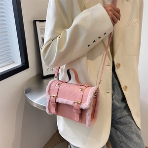 Pink frosted faux suede handbag with faux fur trim and double metal buckles
