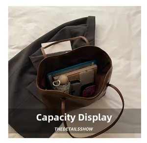 Top view of large brown pebble leather tote bag showing spacious internal storage capacity