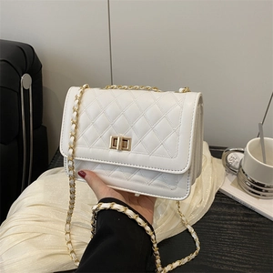 Elegant white quilted crossbody bag with gold chain and square metal twist lock