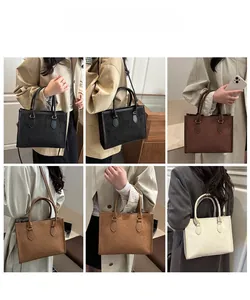 Detailed views of embossed clover pattern on a minimalist matte leather tote bag