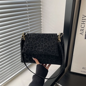 Frosted leopard print shoulder bag with gold chain strap in chic black and grey