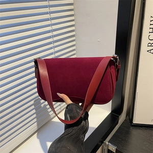 Minimalist burgundy suede underarm bag for women with elegant silver buckle strap