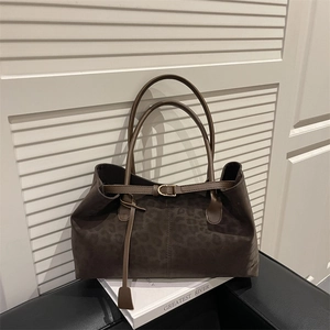 Deep brown leopard print faux suede tote bag with vintage metal buckle and dual shoulder straps
