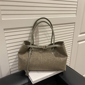 Winter leopard print faux suede tote bag with slim shoulder straps and buckle detail