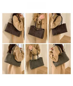Detailed views of large capacity tote bag with decorative buckle and hanging charm