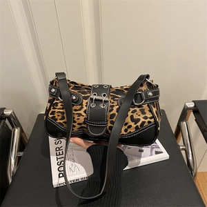Leopard print shoulder bag with vintage buckle and rivet accents for autumn fashion