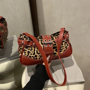 Retro leopard print shoulder bag with red trim and silver buckle hardware