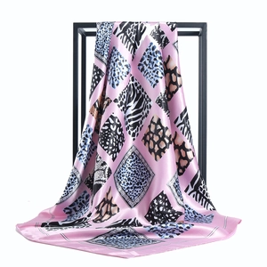 Pink satin square scarf featuring multi-color leopard and zebra print patterns